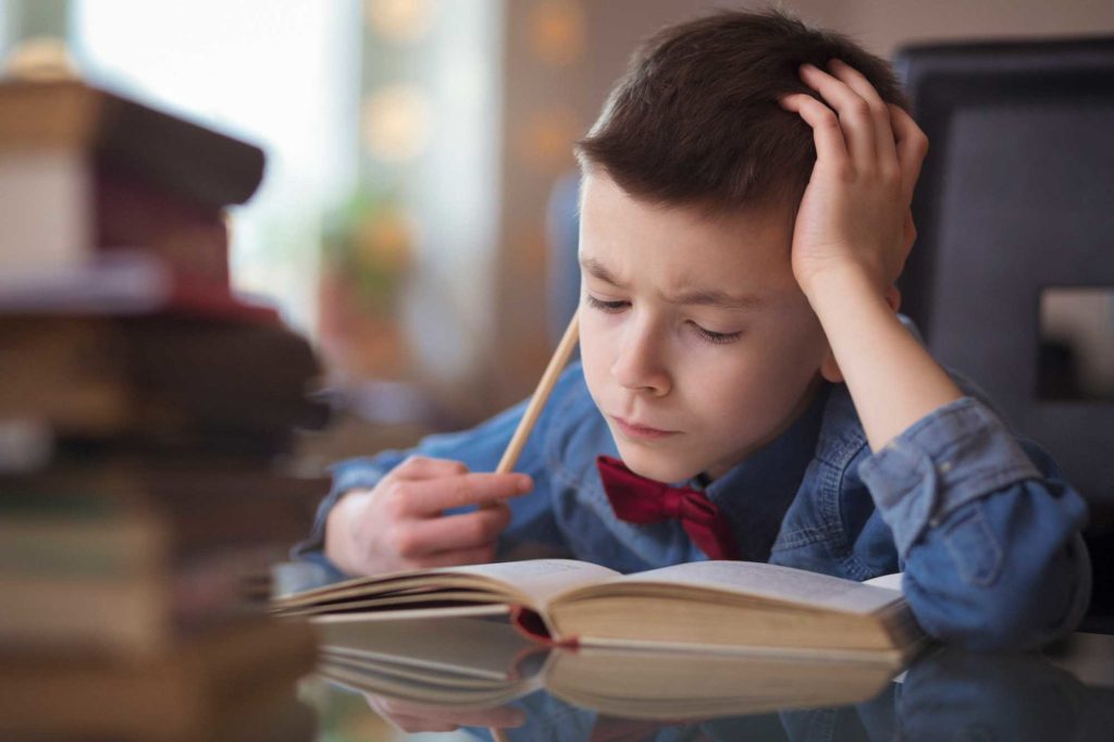 Aspire Academy - Boy Reading